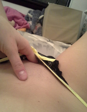 Young looking girl Mary Jane covers her naked body in a messy cake